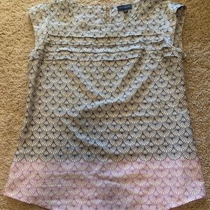 The limited blue and purple blouse with eyelet detail